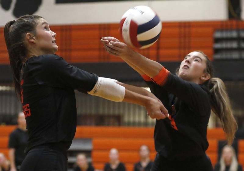 Crystal Lake Central's Clara Dobbertin (left)  and Kanyon Desimone go after the ball during a Fox Valley Conference volleyball match against Huntley on Tuesday,Aug. 26, 2025, at Crystal Lake Central High School.