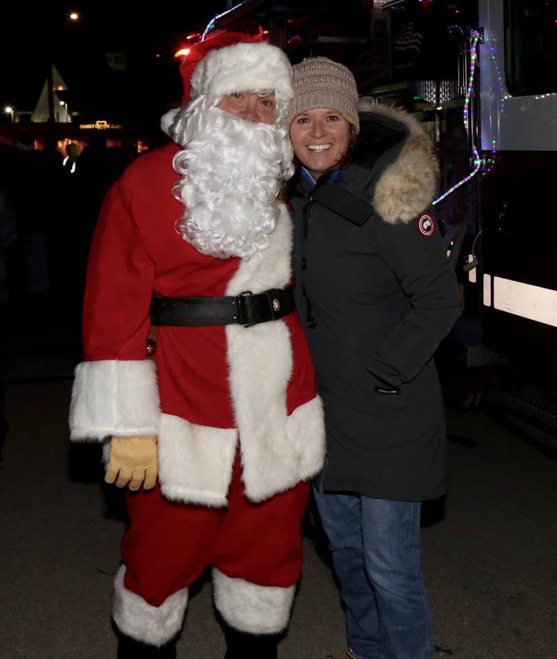 Santa poses with Sugar Grove Village President Jen Konen at the Sugar Grove Holiday Tree Lighting Ceremony on Friday, Dec. 6, 2024.