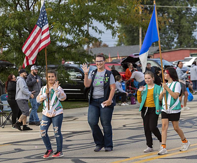 The Girls Scouts finish the parade with the flag Thursday, Sept. 21, 2023 in Rock Falls.