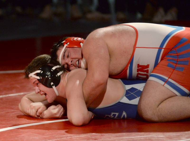 Oregon's Briggs Sellers holds Newman's Matthew Murray on the mat during their 285-pound match at the 1A team sectional held Tuesday, Feb. 25, 2025 in the Blackhawk Center in Oregon.