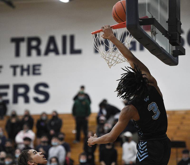 John Starks/jstarks@dailyherald.com
Willowbrook’s Marquel Saleek tries to dunk the ball against Addison Trail in a boys basketball game in Addison on Tuesday, January 18, 2022.