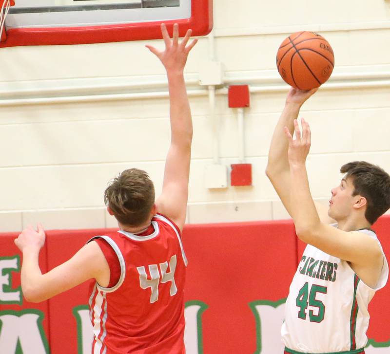 L-P's Brendan Boudreau shoots a shot over Streator's Nolan Lukach on Thursday, Jan. 28, 2023 at L-P High School.