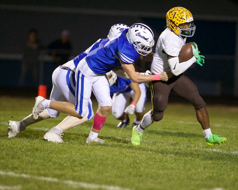 Jacobs Tyson Boddie runs the ball for a gain against Burlington Central on
 Friday, October 4,2024 in Burlington.