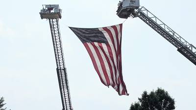 Area firefighters honor retired Oswego firefighter after his passing 