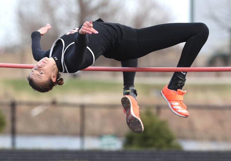 Indian Creek's Brooke Probst clears the bar in the high jump during their meet against the Illinois Math and Science Academy Tuesday, April 19, 2022, at Indian Creek Middle School in Waterman.
