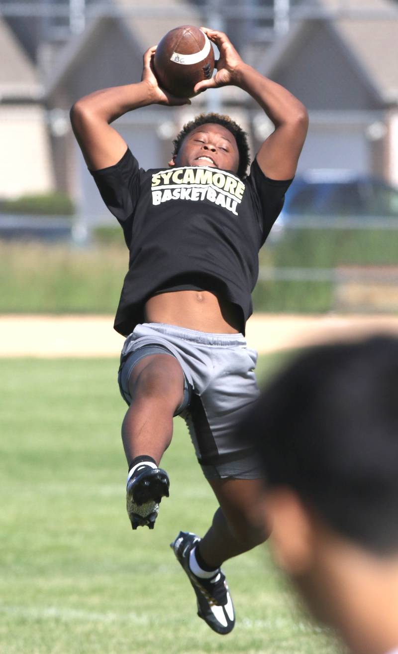Sycamore defensive backs work through a drill Monday, June 27, 2022, during football practice at the school.