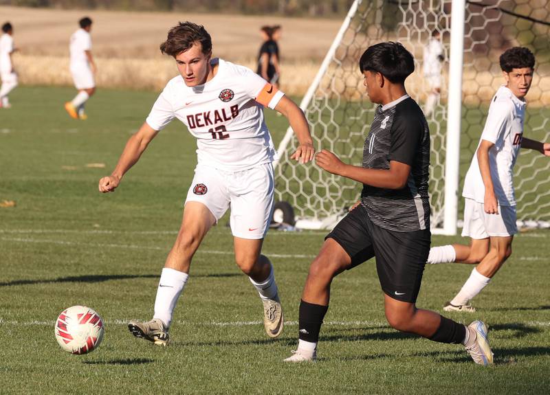DeKalb's Ian Wickens-Walther and Kaneland's Abe Paulino go after the ball during their game Thursday, Oct. 17, 2024, at Kaneland High School in Maple Park.