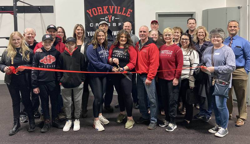 Yorkville Area Chamber of Commerce members, friends, family and community members recently gathered to celebrate the addition of the new youth gym at Yorkville CrossFit. Attendees enjoyed networking while some displayed their athletic abilities. Further information regarding the variety of nutrition and fitness programs available can be found at yorkvillecrossfit.com. (Photo provided)