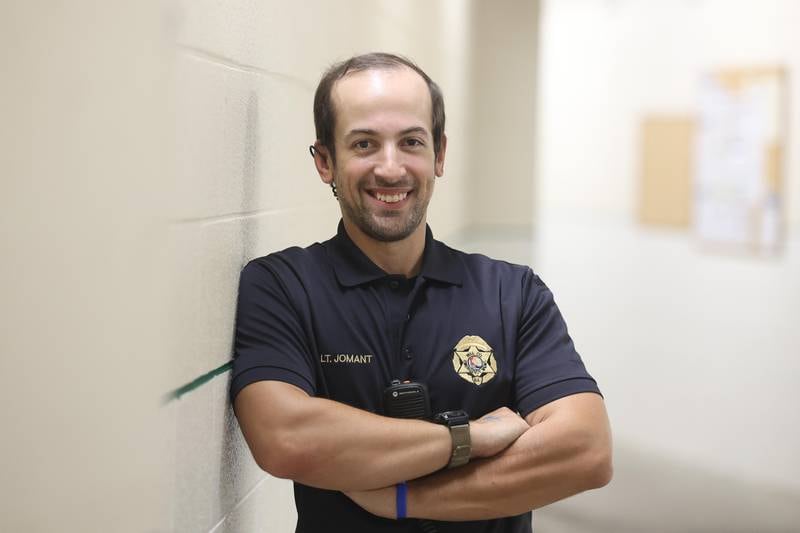 Adam Jomant poses for a photo on Friday, August 23, 2024 in Joliet. Aside from his 9 to 5 job, Adam is a freelancer photographer, a DJ, volunteers with the Emergency Medical Services, part of a storm chasing crew and is an avid hiker.