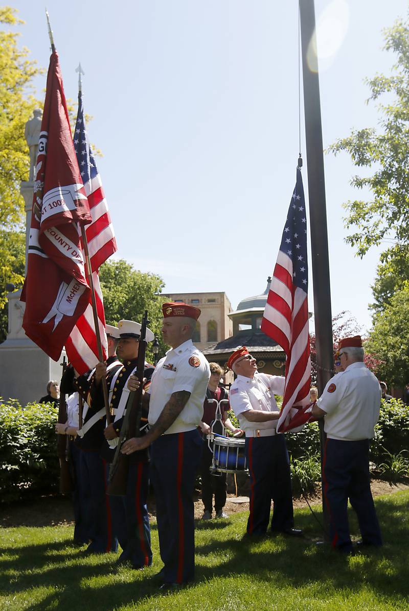 A new American Flag is raised by members of the McHenry County Marine Corps League during the Woodstock VFW Post 5040 City Square Memorial Day Ceremony and Parade Monday, May 29, 2023, in Woodstock.