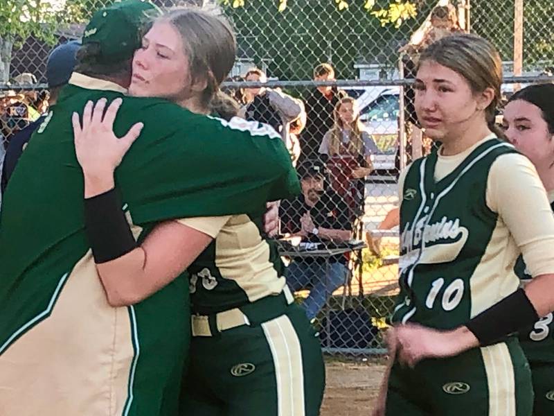 St. Bede coach Shawn Sons hugs senior Ryann Stoudt after Friday's 2-1 loss in the sectional championship.