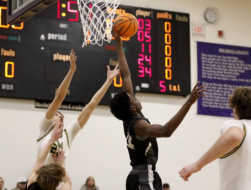 Kaneland's Jeffrey Hassan intercepts a pass to Crystal Lake South's Anthony Santarelli during the IHSA Class 3A Rochelle Sectional championship basketball game on Friday, March 7, 2025, at Rochelle High School.
