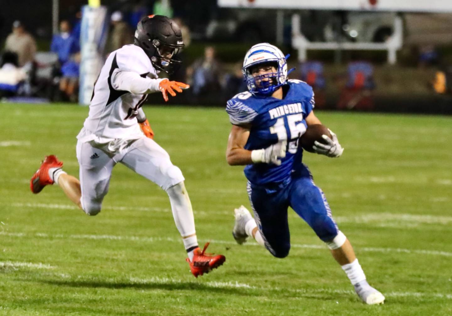 Princeton senior Augie Christiansen runs the ball against Kewanee Friday night.