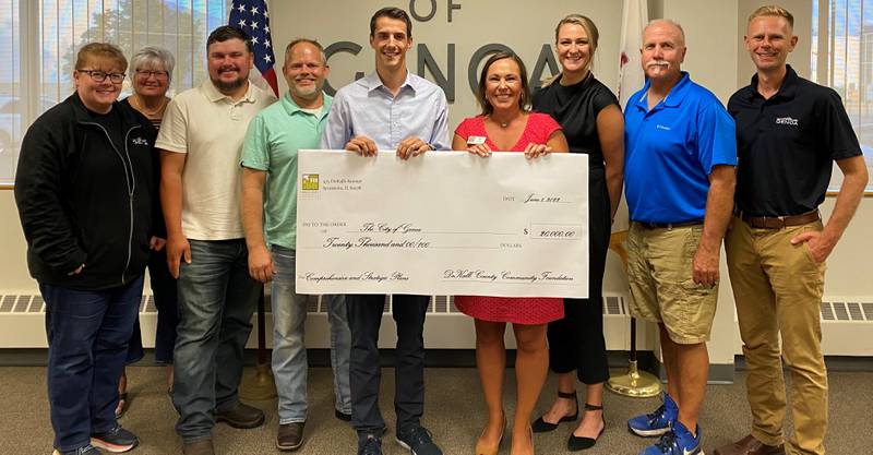 The City of Genoa city council receiving a $20,000 Community Economic Development Implementation Grant check from the DeKalb County Community Foundation in June of 2022.