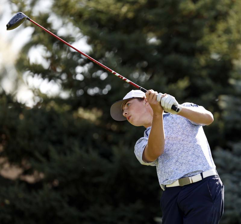 Tyler Samaan	 of Central watches his tee shot during the Class 3A boys golf sectional Monday, Oct. 6, 2025 at the Buffalo Grove Golf Club in Buffalo Grove.