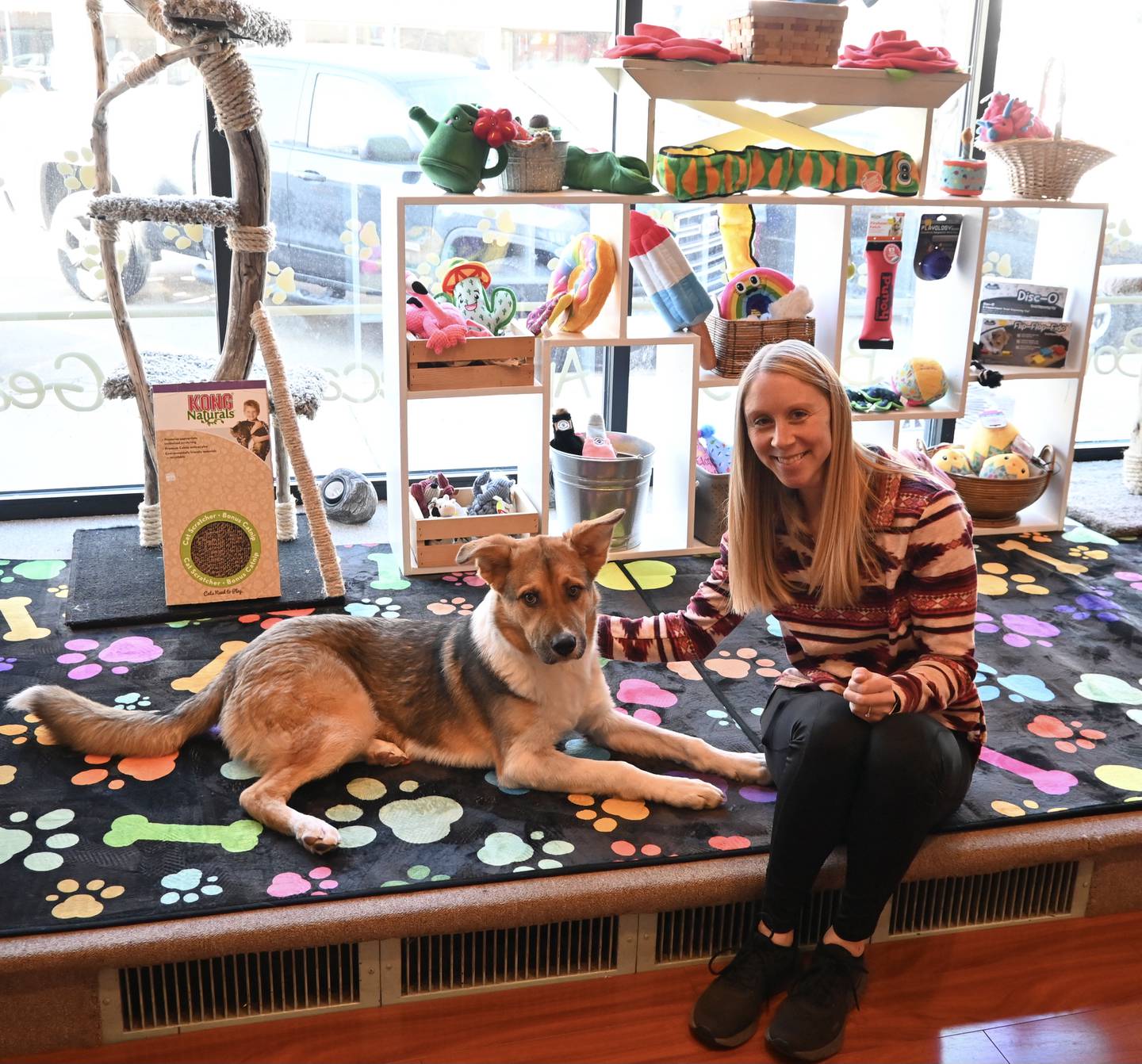 Jenny Patton, co-owner of Cat & Hound,  with Vino.