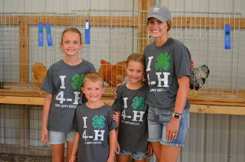 Hume Happy Hustlers 4-H Club members Emma Gillette, 10, “Cloverbud” Cole Downie, 6, Tinley Downie, 9, and mom Kaley, all of Rock Falls, had poultry exhibits at the Whiteside County 4-H fair.