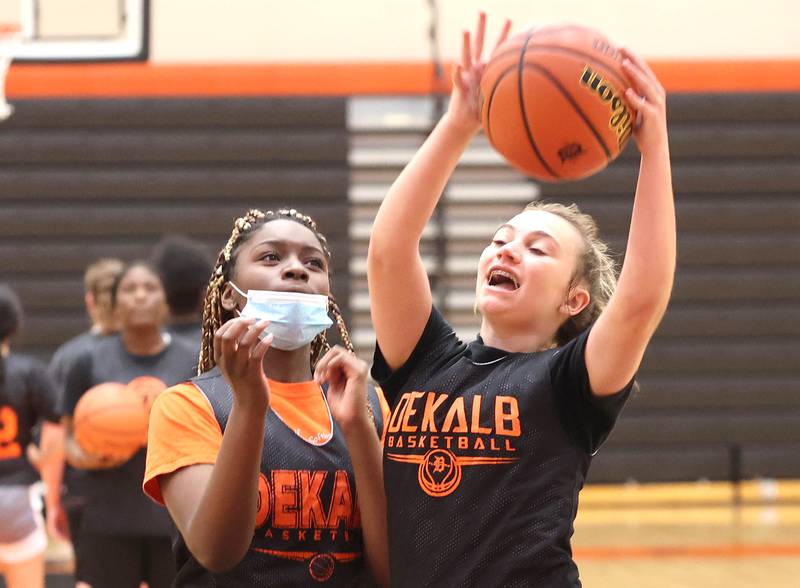 DeKalb's Ella Russell grabs a rebound during a drill Thursday, June 23, 2022, at girls basketball practice at DeKalb High School.