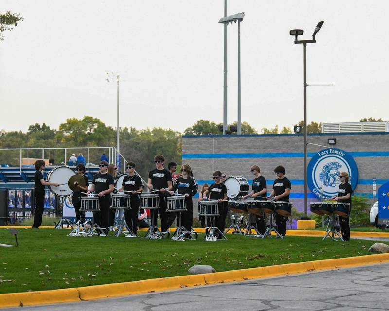 St. Francis’s drumline preforms outside the stadium before the start of the varsity football game on Friday Sep. 29, 2023, held at St. Francis in Wheaton.