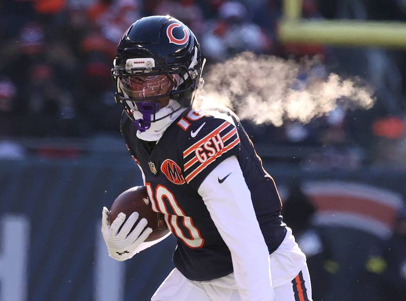 Chicago Bears wide receiver Luther Burden III takes a screen pass for good yardage during their game against the Cleveland Browns Sunday, Dec. 14, 2025, at Soldier Field in Chicago.