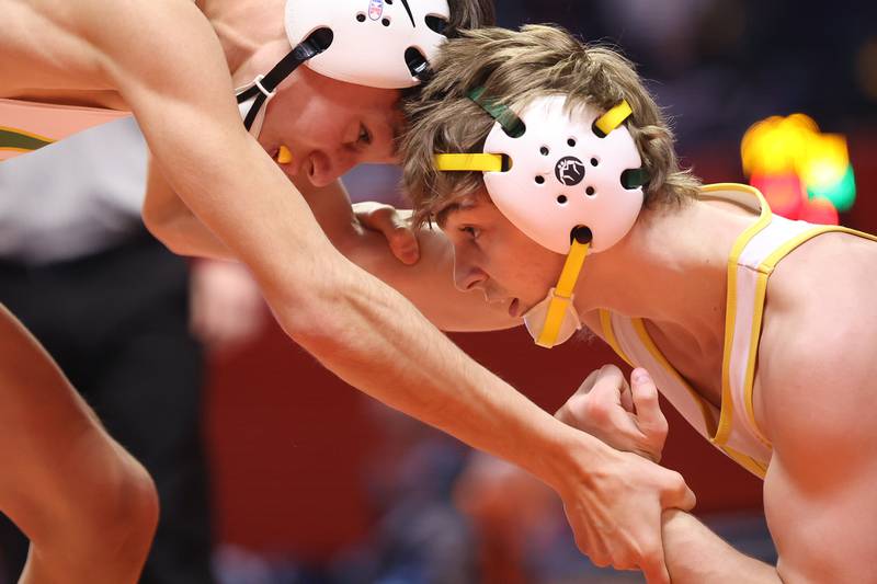 Crystal Lake South’s Josh Glover (right) faces off with Geneseo’s Zachary Montez in the Class 2A 113lb. 3rd place match at State Farm Center in Champaign. Saturday, Feb. 19, 2022, in Champaign.