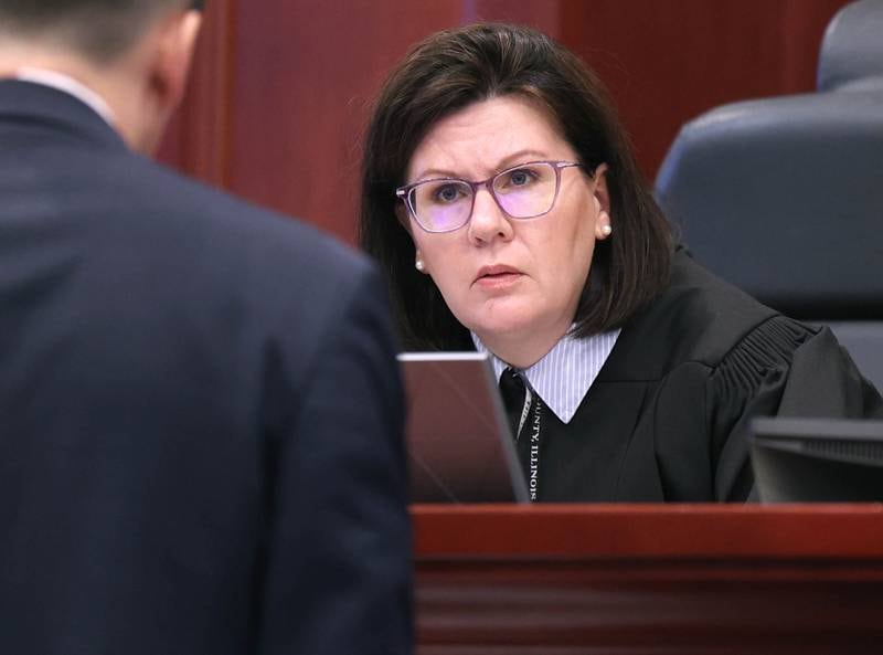 DeKalb County Associate Judge Stephanie Klein listens too special prosecutor Derek Dion during a sidebar Wednesday, Feb. 18, 2026, during Hamza Khatatbeh’s murder trial at the DeKalb County Courthouse in Sycamore. Khatatbeh, 17, is accused of fatally stabbing Sycamore 17-year-old Kaleb McCall in 2023.