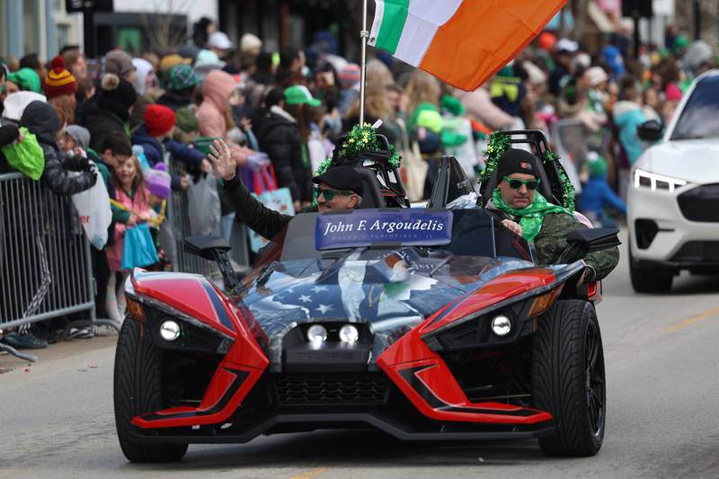 Plainfield Mayor John Agoudelis waves to the crowds at the Plainfield Hometown Irish Parade on Sunday, March 17, 2024 in Plainfield.