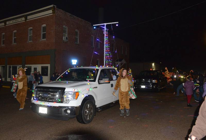 Prophetstown's Light Up the Park gave out glow sticks to the crowd during the Erie Hometown Holidays Lighted Parade on Saturday, Dec. 2, 2023.