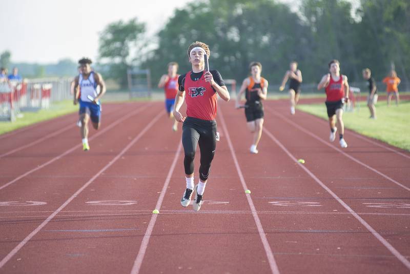 Erie's Braxton Froeliger crosses the finish in the 4x200 at the class 1A Erie track sectionals on Thursday, May 19, 2022.