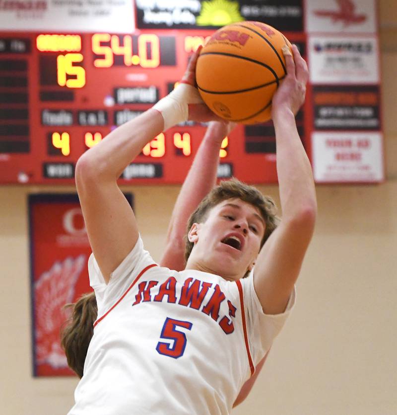 Oregon's Tucker O'Brien (5) rebounds against Polo on Friday, Dec. 5, 2025 at the Blackhawk Center in Oregon.