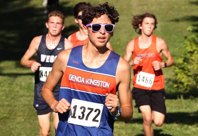 Genoa-Kingston’s Gabriel Peña leads a group down a hill during the boys varsity race Tuesday, Sept. 3, 2024, at the Sycamore Cross Country Invite at Kishwaukee College in Malta.