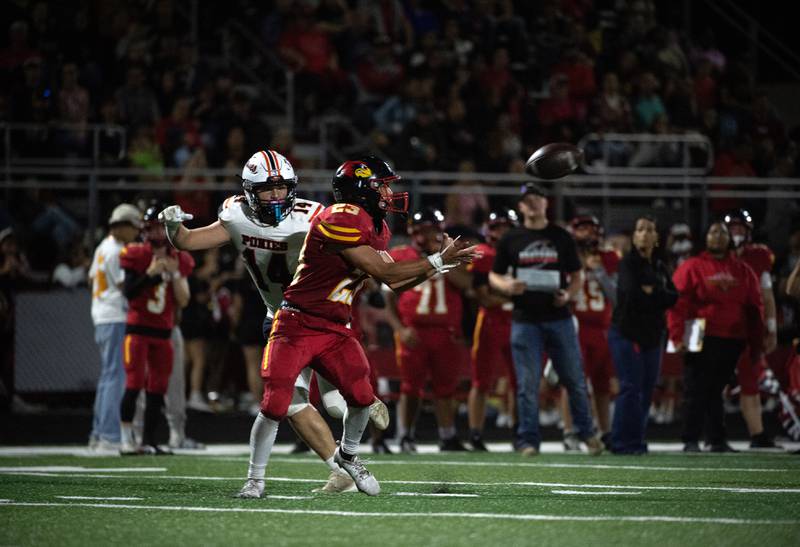 St. Anne's Gavin Threm makes a reception as South Fork's Ian Dial defends in a game on Friday, Spetember 26, 2025.