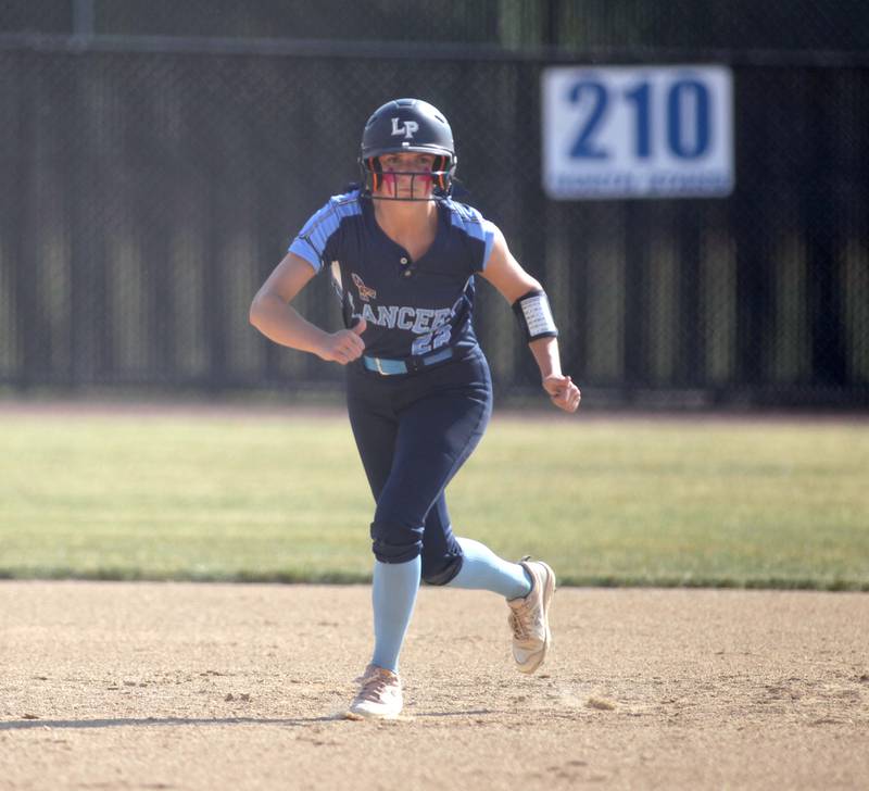 Lake Park’s Cailynn Gdowski rounds second base during a Class 4A St. Charles North Sectional final against St. Charles North on Friday, June 2, 2023.