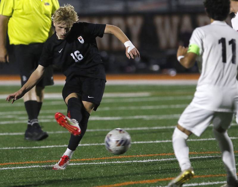 McHenry's Cody Bundy takes a shot on goal during a Fox Valley Conference boys soccer match against Prairie Ridge on Tuesday, Sept. 30, 2025, at McCracken Field in McHenry.