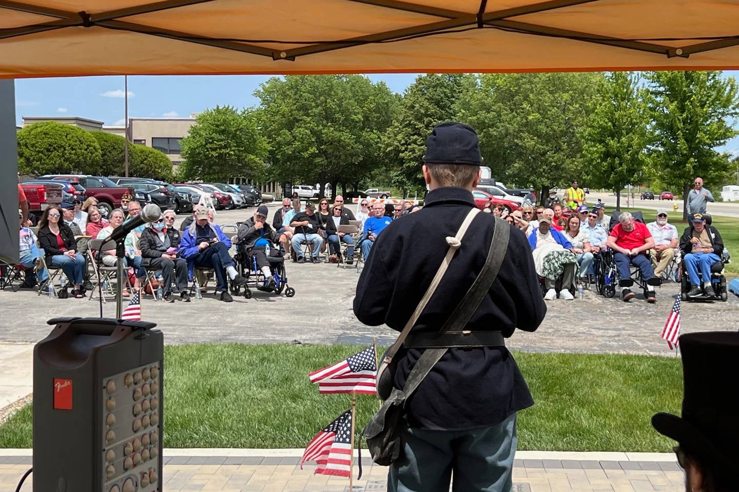 George Helwich speaks to assembled crowd at the Ray Olley Memorial Day service on Saturday, May 24, 2025.