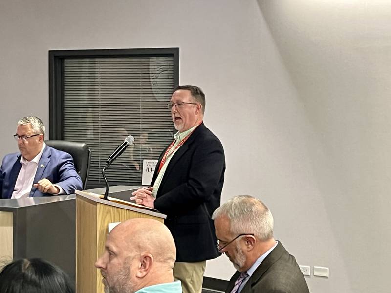 Representing Yorkville School District 115, Kreg Wesley, assistant superintendent of business services, tells the city council at their March 11 meeting that the school district is in a capacity crisis and cannot handle any more students coming in because of new residential developments.