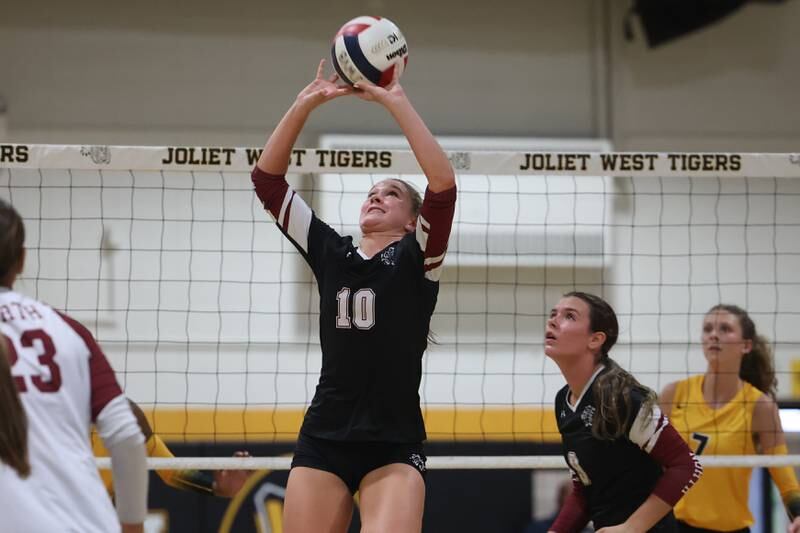 Plainfield North’s Ella Strausberger sets the ball against Joliet West on Wednesday, Sept. 6, 2023 in Joliet.