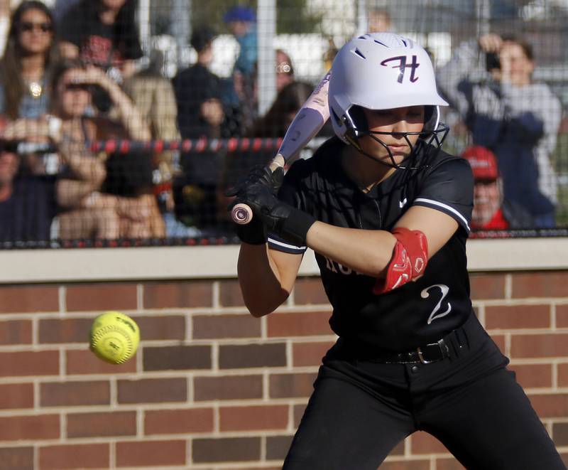 Huntley's Piper Heimbrodt lays of a ball during a Fox Valley Conference softball game against Hampshire on Thursday, May 14, 2026, at Huntley High School.