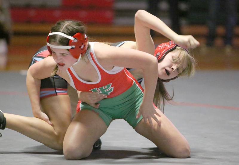 L-P's Emma Tomlinson wrestles Ottawa's Chloe Carmona on Thursday, Jan. 9, 2025 in Sellett Gymnasium at L-P High School.