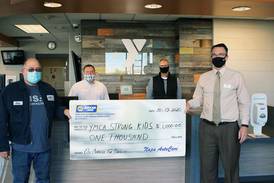 NAPA centers donate to YMCA