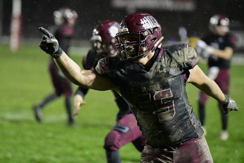 Marengo offensive lineman Mason Feldt celebrates following a Marengo touchdown during a Class 4A first-round game against Manteno last season.