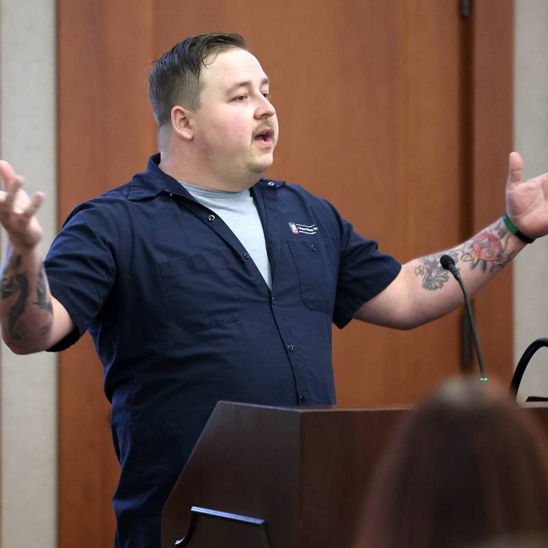 Patrick Sheridan, president of AFSCME Local 963 representing building and food service workers, speaks about low wages during the Northern Illinois University Board of Trustees meeting Thursday, Sept. 21, 2023, in Altgeld Hall on campus in Dekalb. Several NIU employees, represented by the American Federation of State, County and Municipal Employees, attended the meeting seeking a fast resolution to a contract with higher pay.
