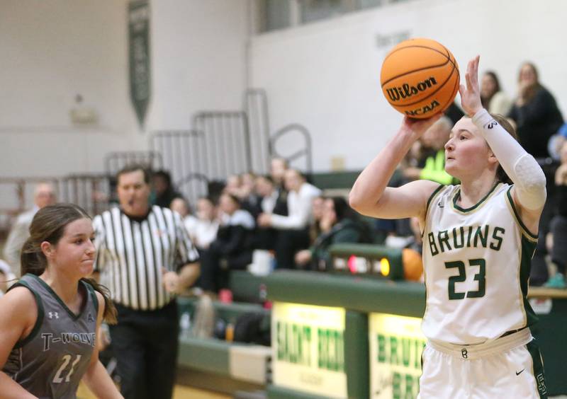 St. Bede's Lili McClain shoots a jump shot over Midland's Adalynn Stickel on Thursday, Dec. 4, 2025 at St. Bede Academy.