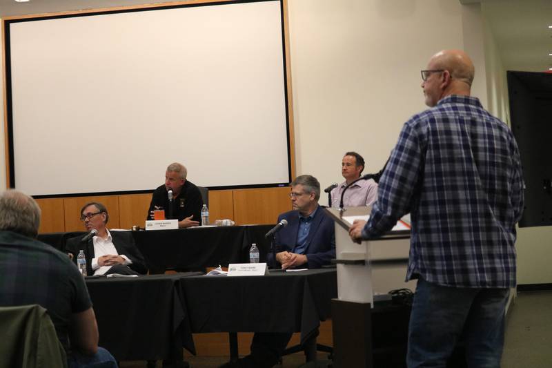 DeKalb Iron and Metal Company Owner Danny Meyers (right) speaks before members of the DeKalb City Council at their Sept. 26, 2022 meeting.