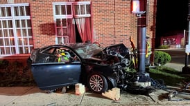 Driver charged with DUI after crashing into building in McHenry