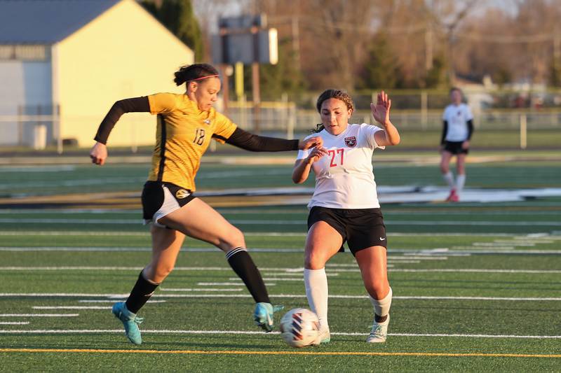 Herscher's Leia Haubner defends an attack by Bradley-Bourbonnais' Aaliyah Lanum during the Tigers' 3-2 victory over the Boilermakers on Tuesday, April 15, 2025.
