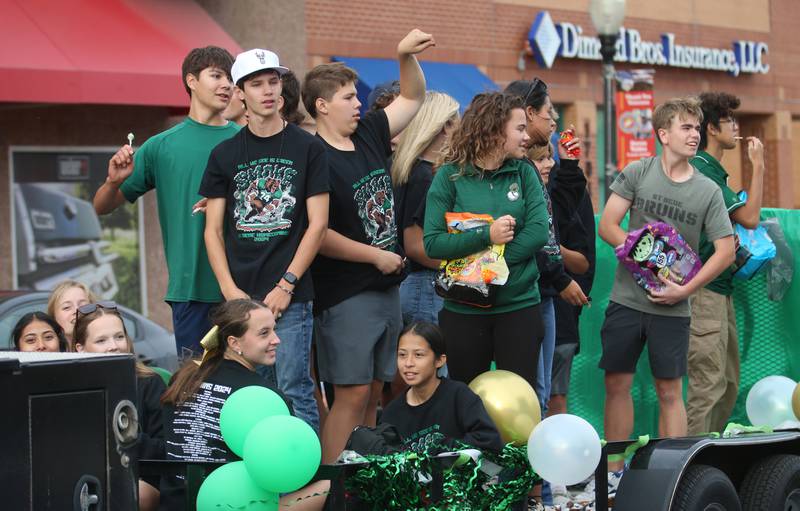 St. Bede students ride on a float during the St. Bede Homecoming parade on Friday, Sept. 27, 2024 downtown Peru.