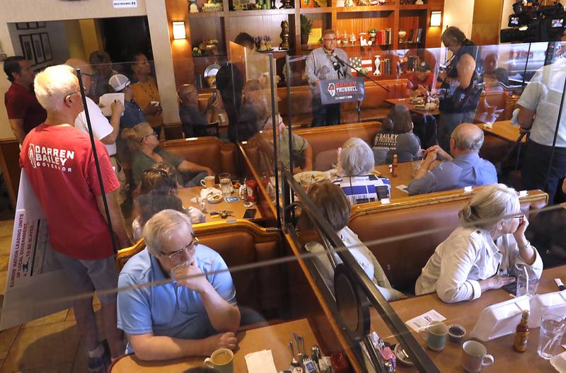 Republican candidate for governor Darren Bailey campaigns Wednesday, Sept. 21, 2022, at Around the Clock Restaurant, 5011 Northwest Highway, in Crystal Lake, during a nine-city bus tour, with his Lt. Governor candidate Stephanie Trussell.