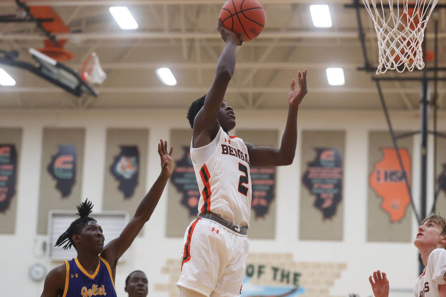 Plainfield East’s Ehi Ogbomo takes a shot a shot against Joliet Central.
