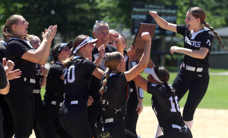 Prairie Ridge’s Wolves celebrate  a win over Harvard during Class 3A softball regional final action at Lions Park in Harvard Saturday.
